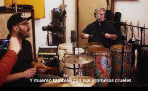 chendy leon and luis orbegoso singing and playing percussion